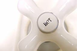 hot water tank button